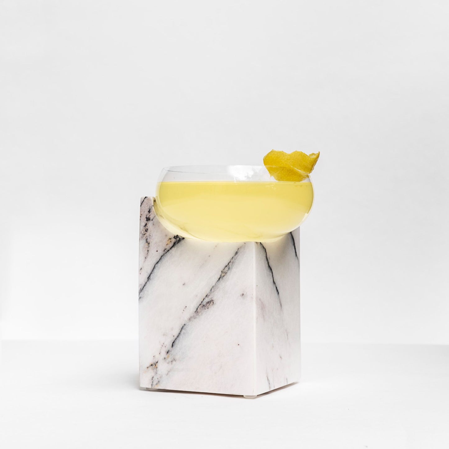 CLIFFHANGER COCKTAIL GLASS - WHITE MARBLE